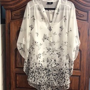 Blouse with slip underneath.